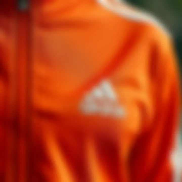 Fabric Texture and Design of Adidas Tracksuit Top Close-up of the fabric texture and design details of an Adidas tracksuit top