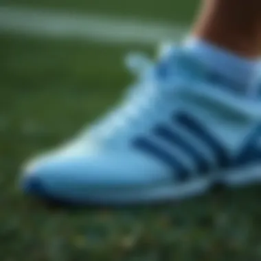 Close-up of Adidas turf shoes showcasing performance features