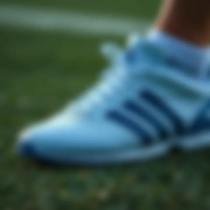 Close-up of Adidas turf shoes showcasing performance features