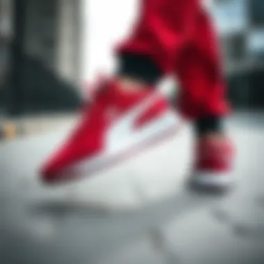 Stylish Puma red sports shoes paired with trendy sportswear