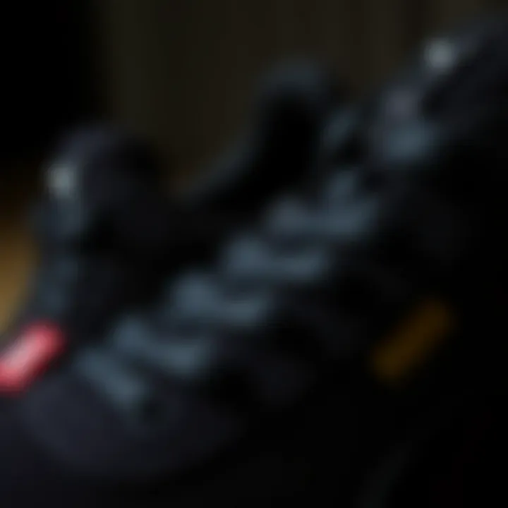 Close-up of black Puma Suede shoes highlighting texture