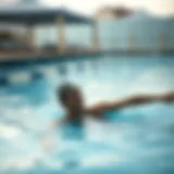 An individual enjoying a serene swimming experience in a tranquil pool.